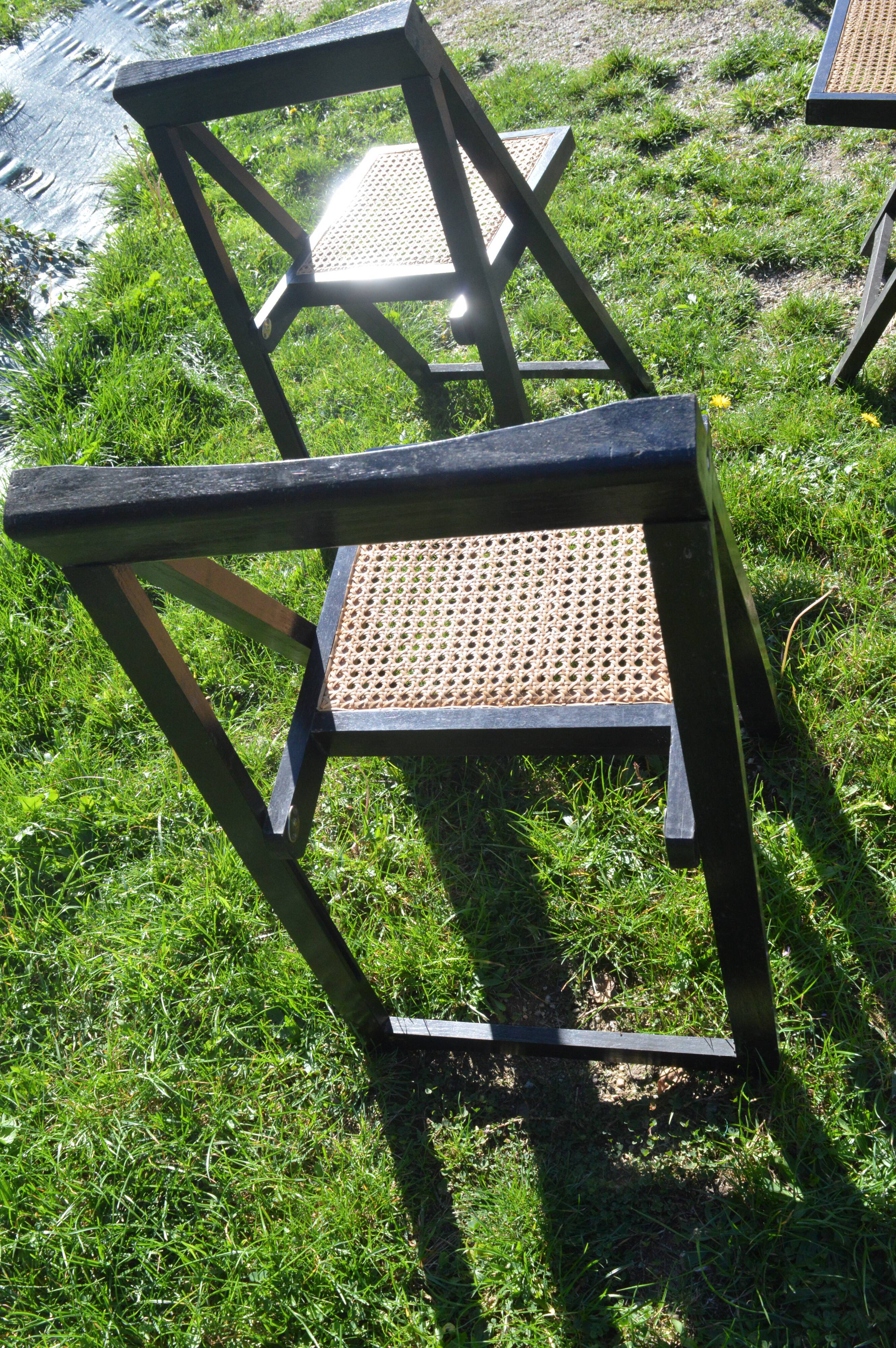 Suite of four folding chairs
