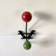 Small double coat hook in metal and wood painted green and red, 1950s-60s