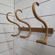 Curved wooden coat rack with 3 hooks, 1920s.