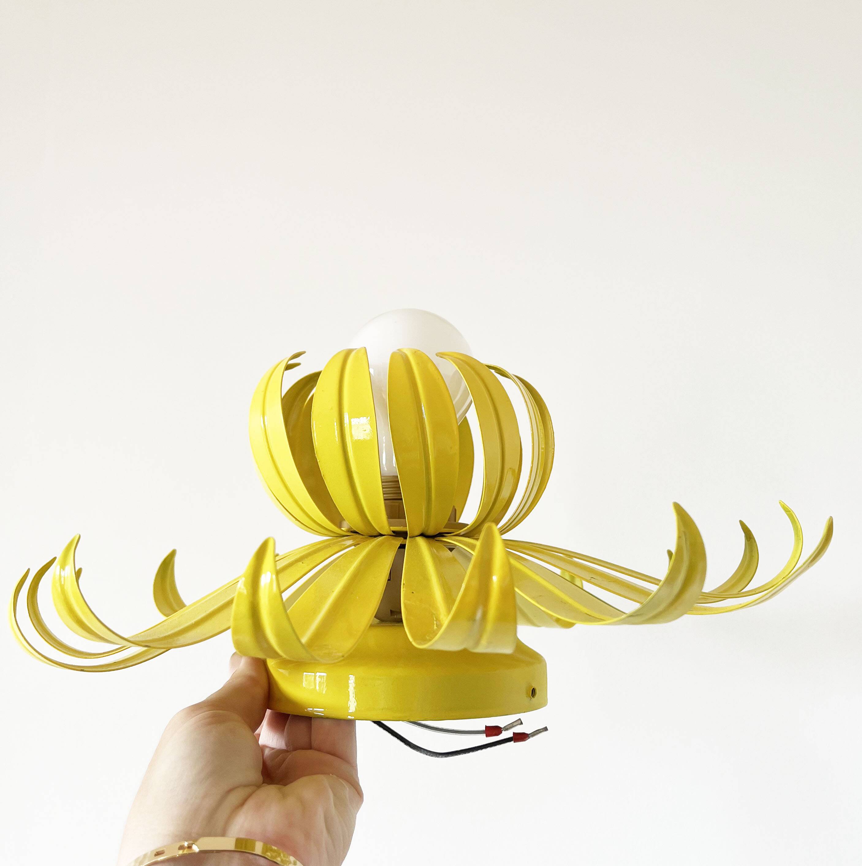Vintage yellow metal flower wall light