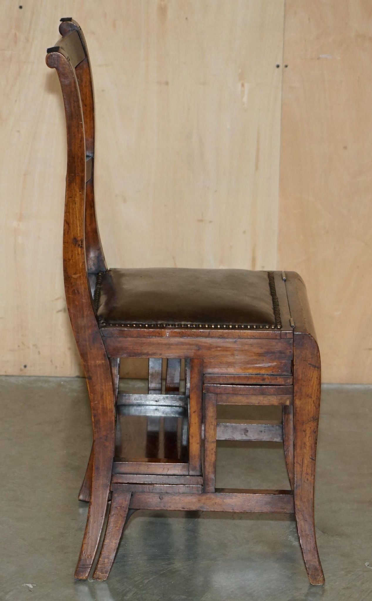 Victorian library chair, convertible, hardwood, leather, brass, circa 1880.