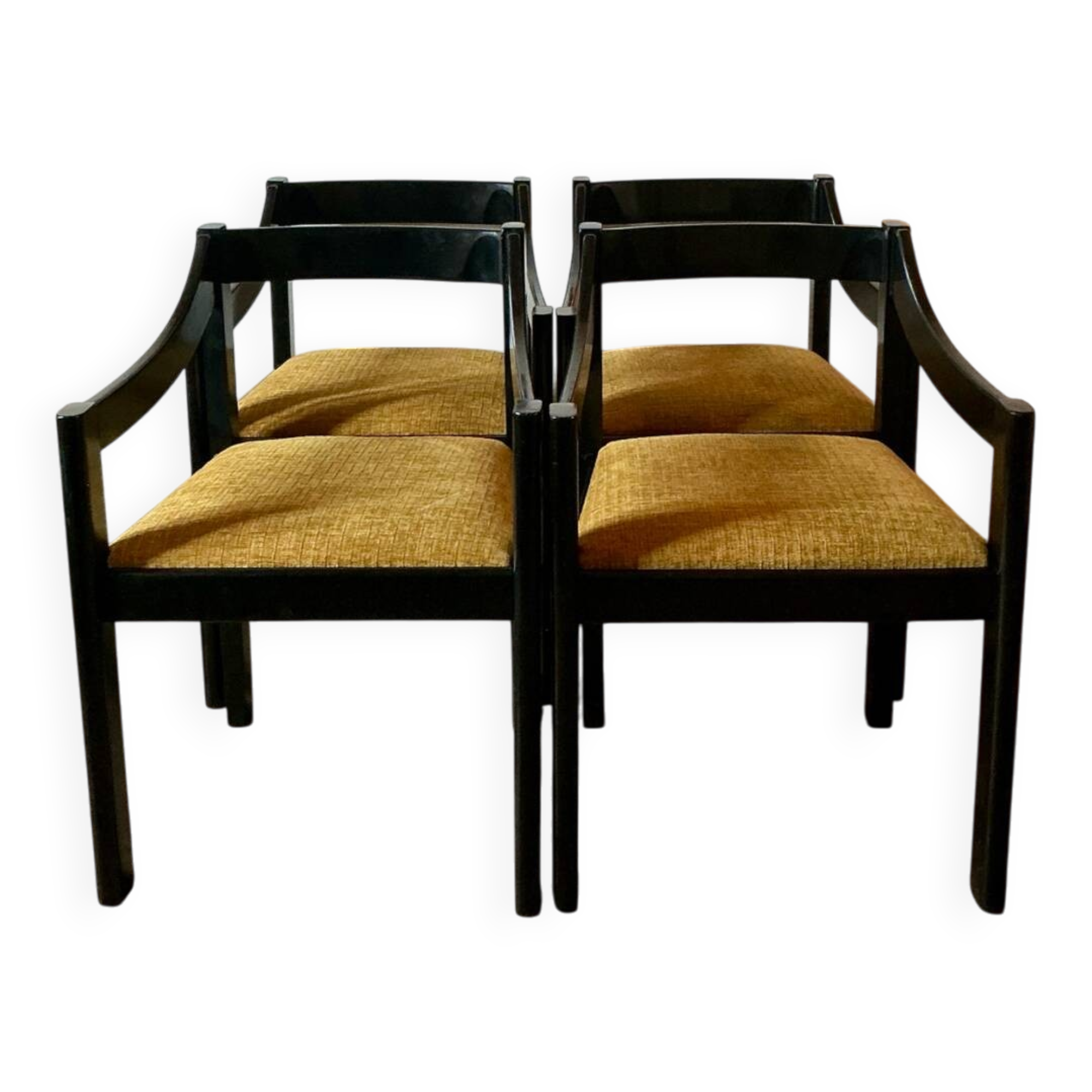 Four designer armchairs