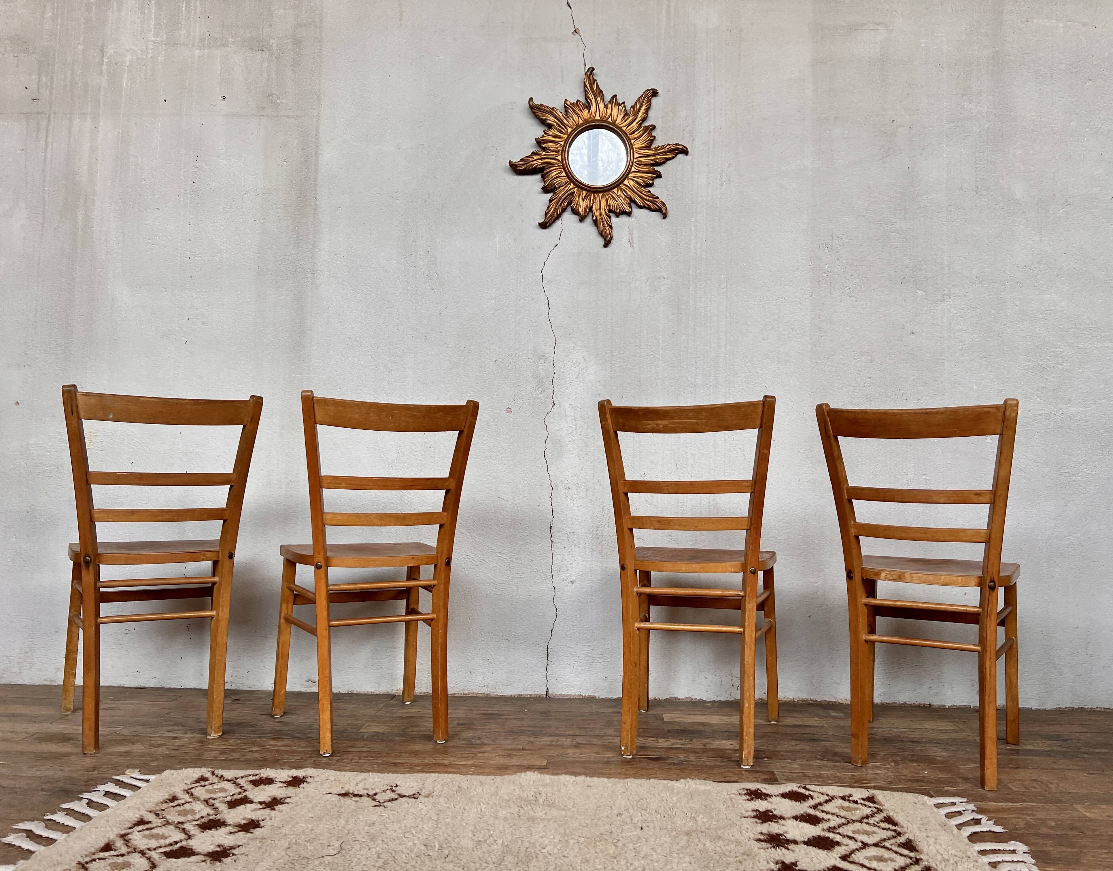 Series of 4 vintage light wood bistro chairs