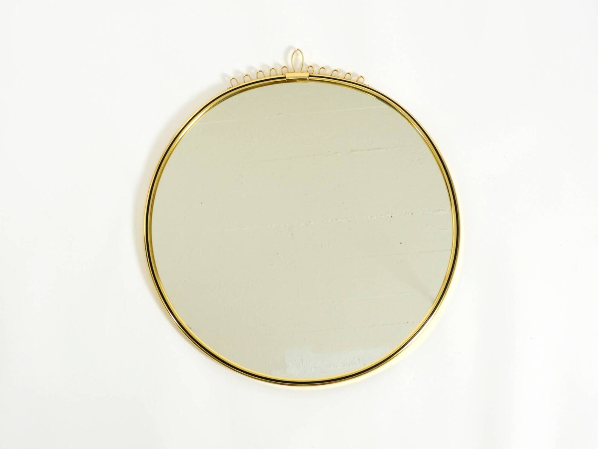 Beautiful, heavy Mid-Century Modern brass wall mirror by Lenz, 1964