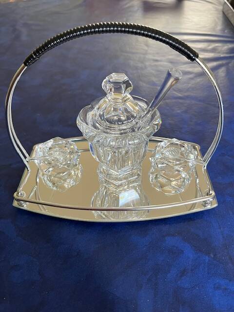 Mustard pot, salt shaker, and pepper shaker set in Baccara crystal, France.