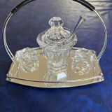 Mustard pot, salt shaker, and pepper shaker set in Baccara crystal, France.