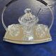 Mustard pot, salt shaker, and pepper shaker set in Baccara crystal, France.