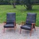 Pair of vintage beech armchairs feet compass covered with black moleskine from the 50s