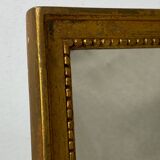 Miroir vintage en bois à poser ou à suspendre de couleur dorée