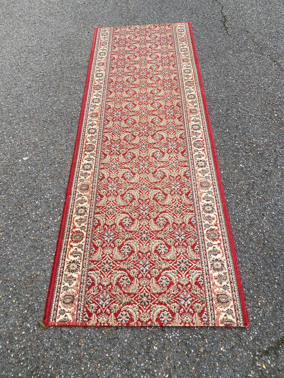 Long Persian rug in burgundy red wool with flowers, handmade 205x70
