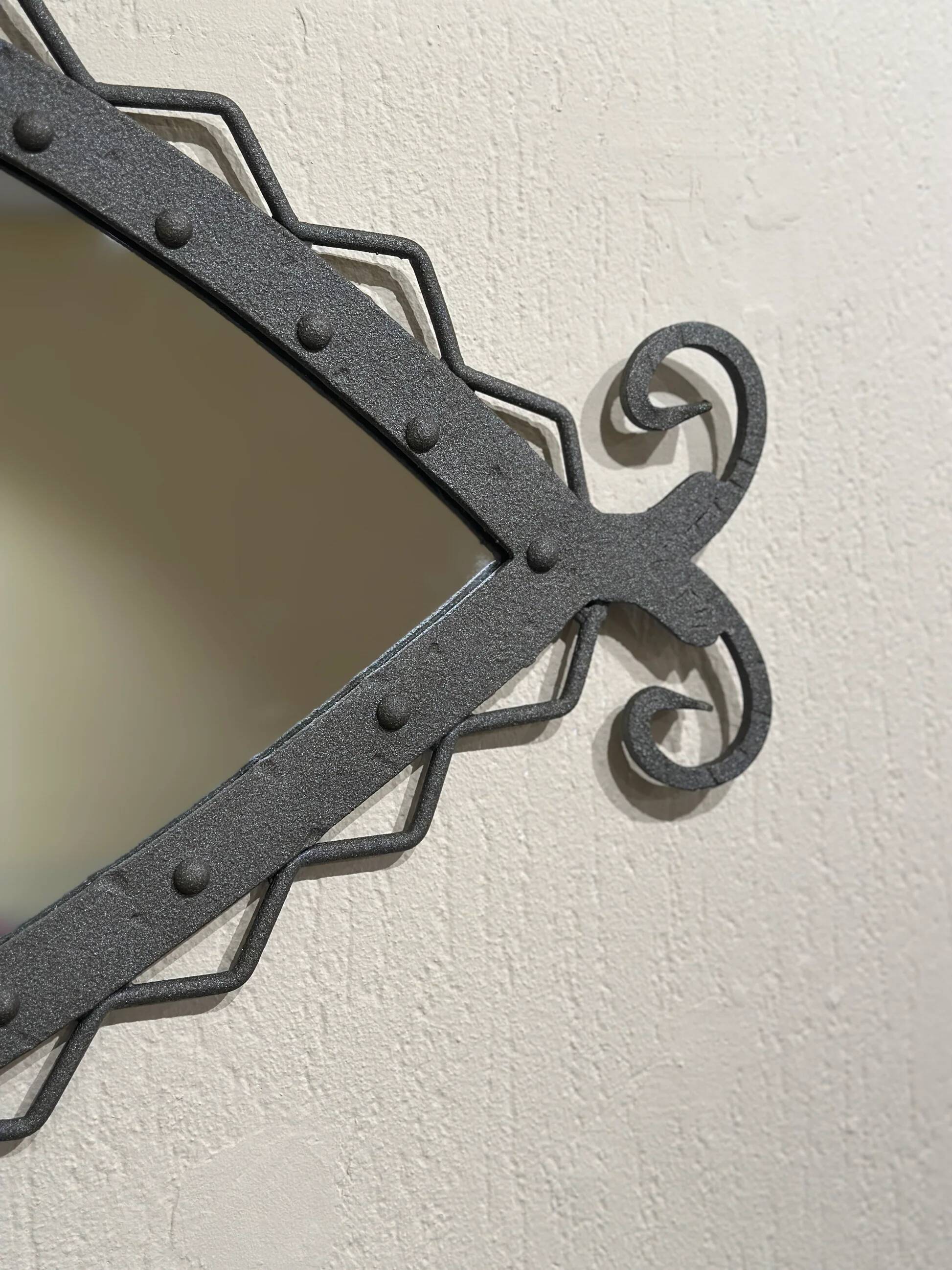 Hand-forged iron mirror with riveted frame, Italy, 1960s