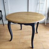 Antique extendable round table with Louis XV style extension
