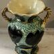 Pair of Vallauris vases in turquoise and black ceramic enhanced with o