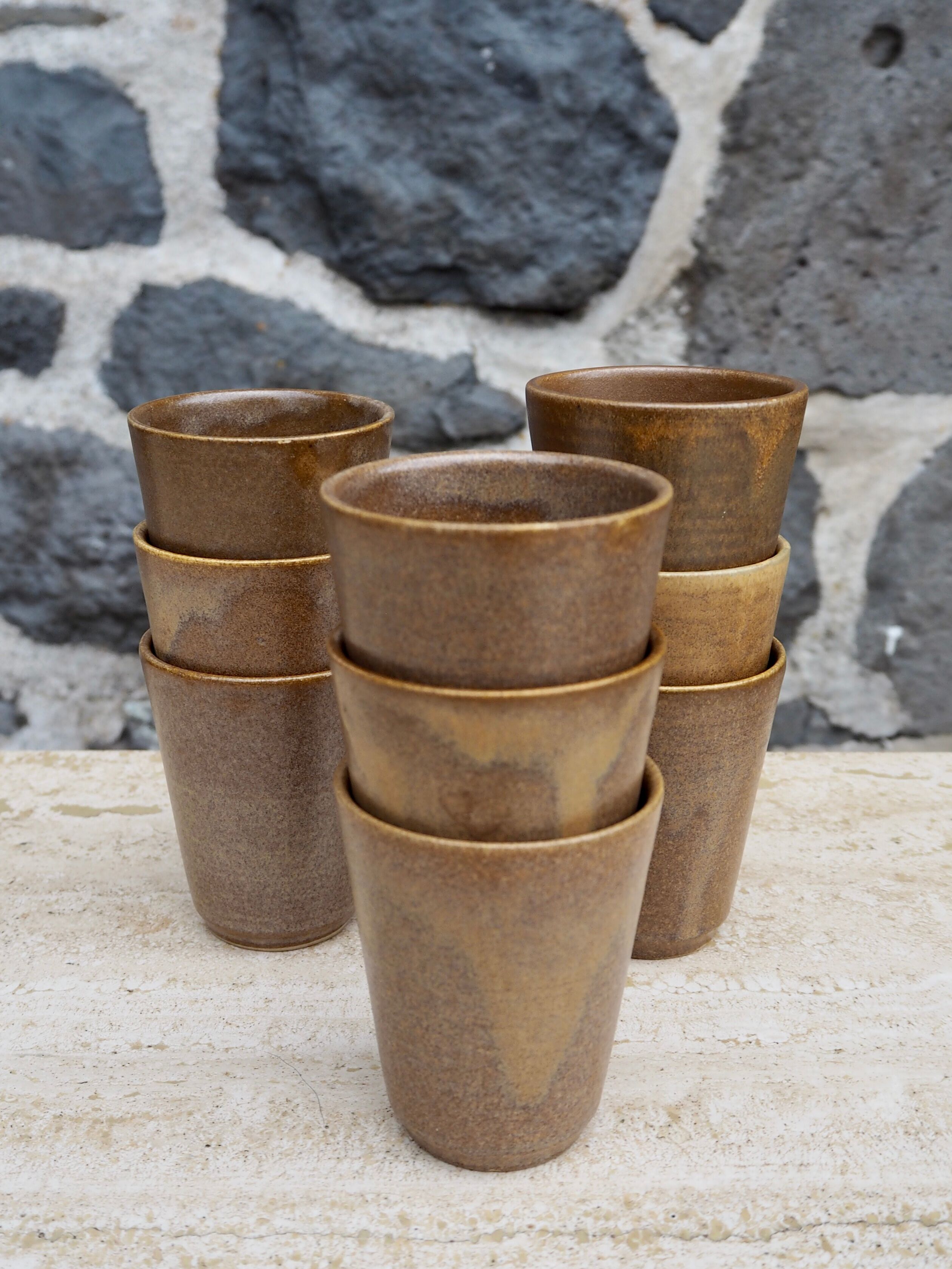 Set of 9 cups in Digoin sandstone