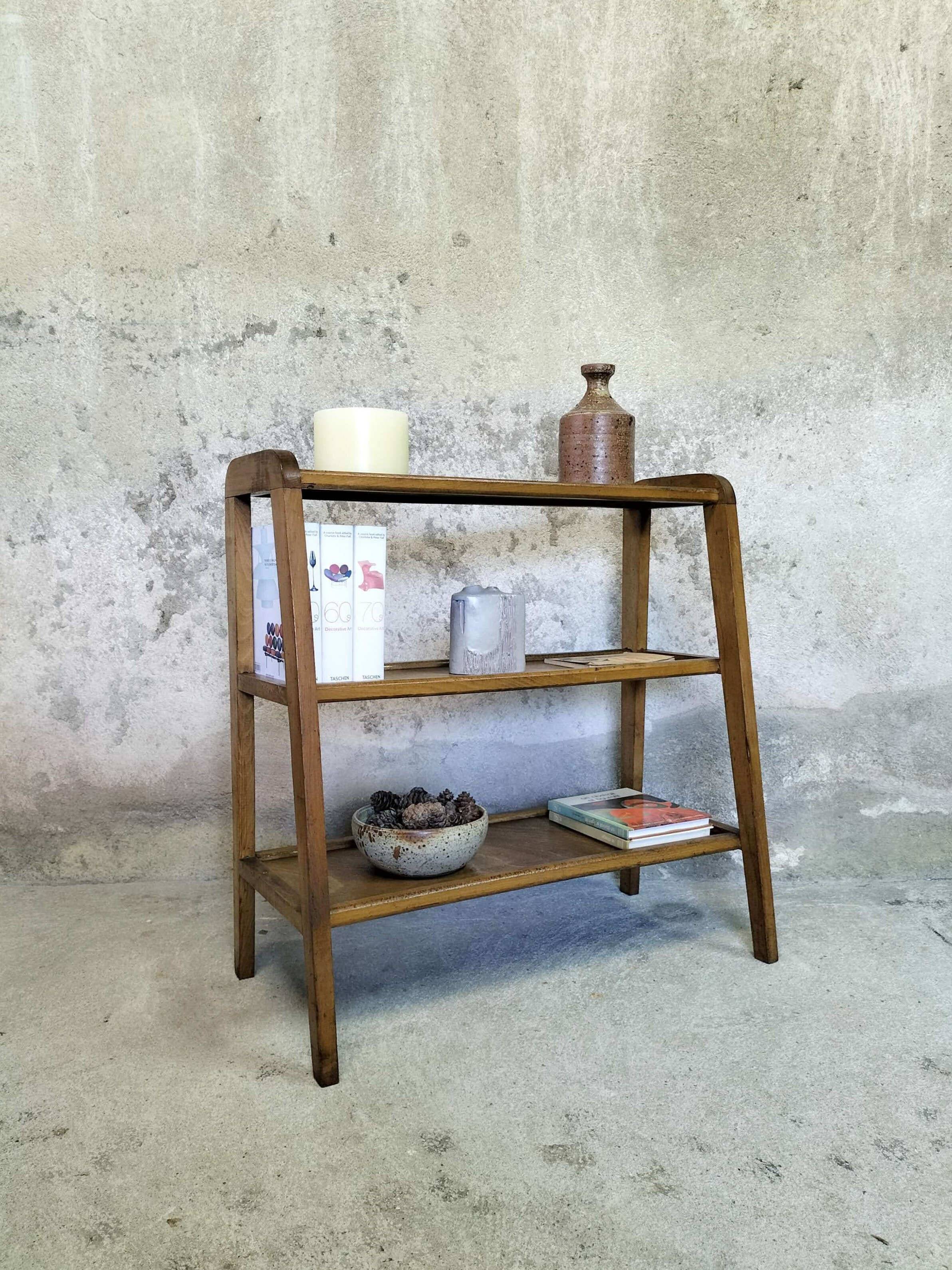 Vintage shelf on wooden legs in wood