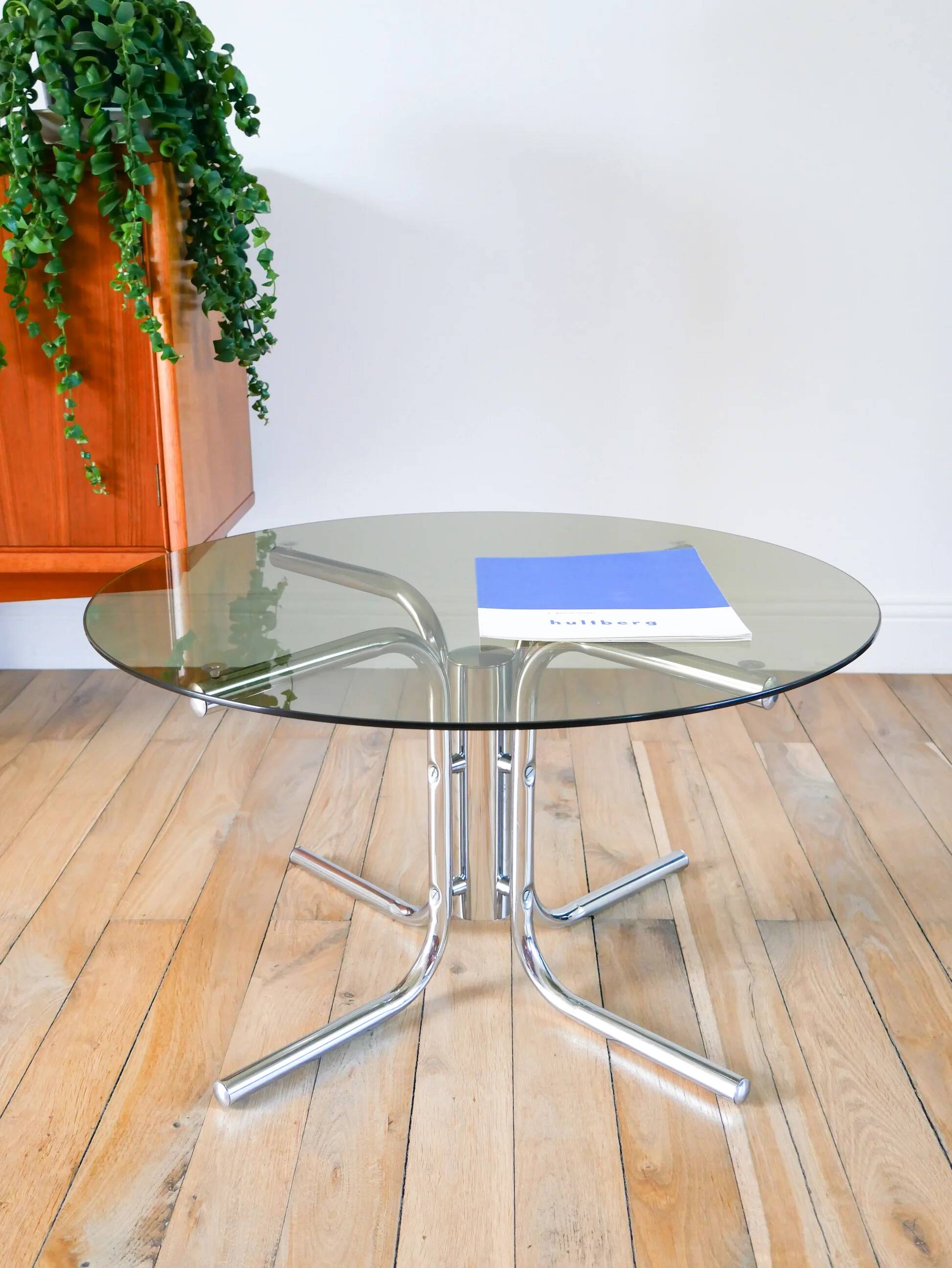 Round coffee table in smoked glass and chrome, star base, design, 1970.