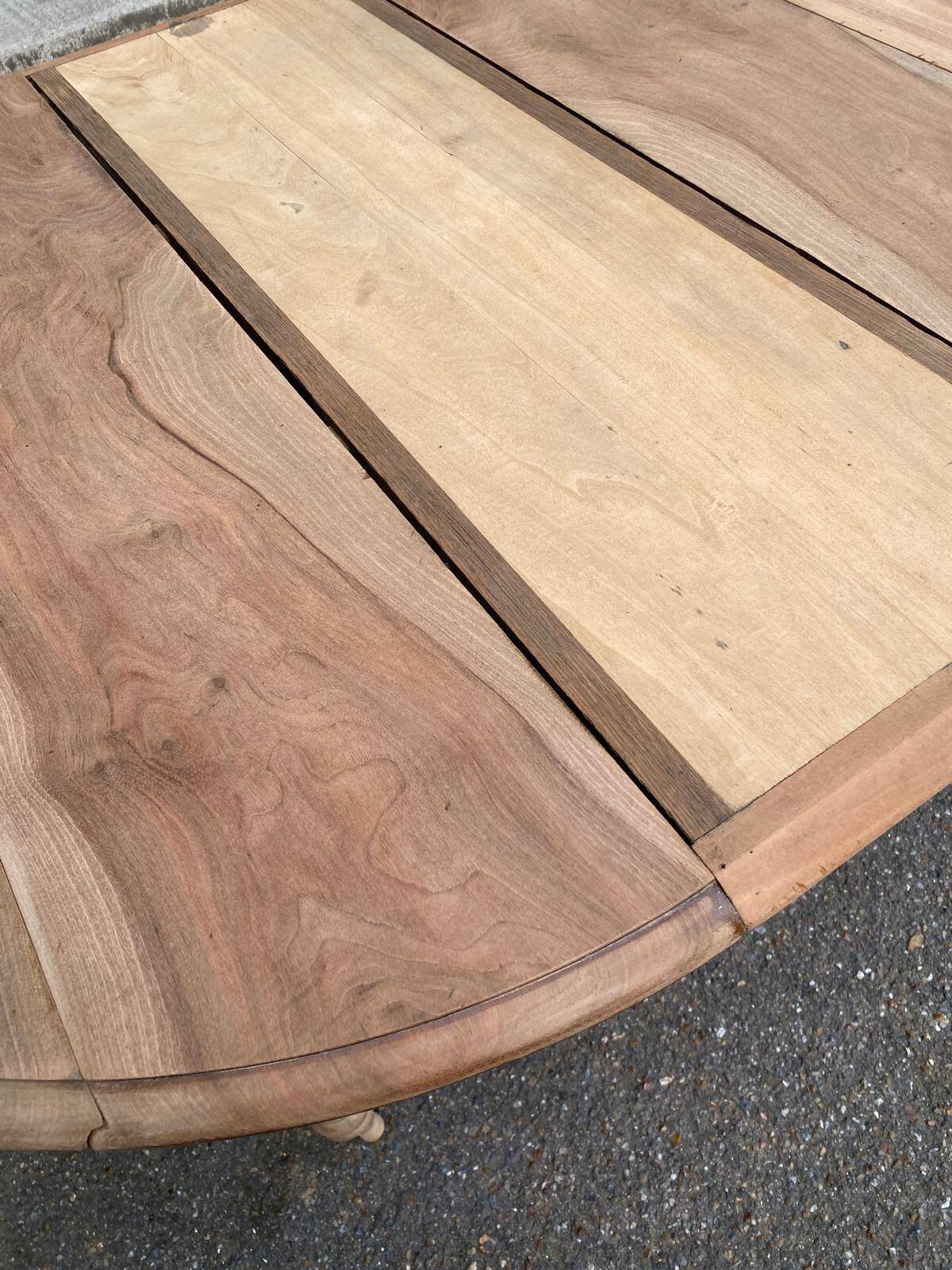 Renovated 18th century solid wood extendable round dining table with shutters