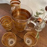 Vintage golden orangeade service.