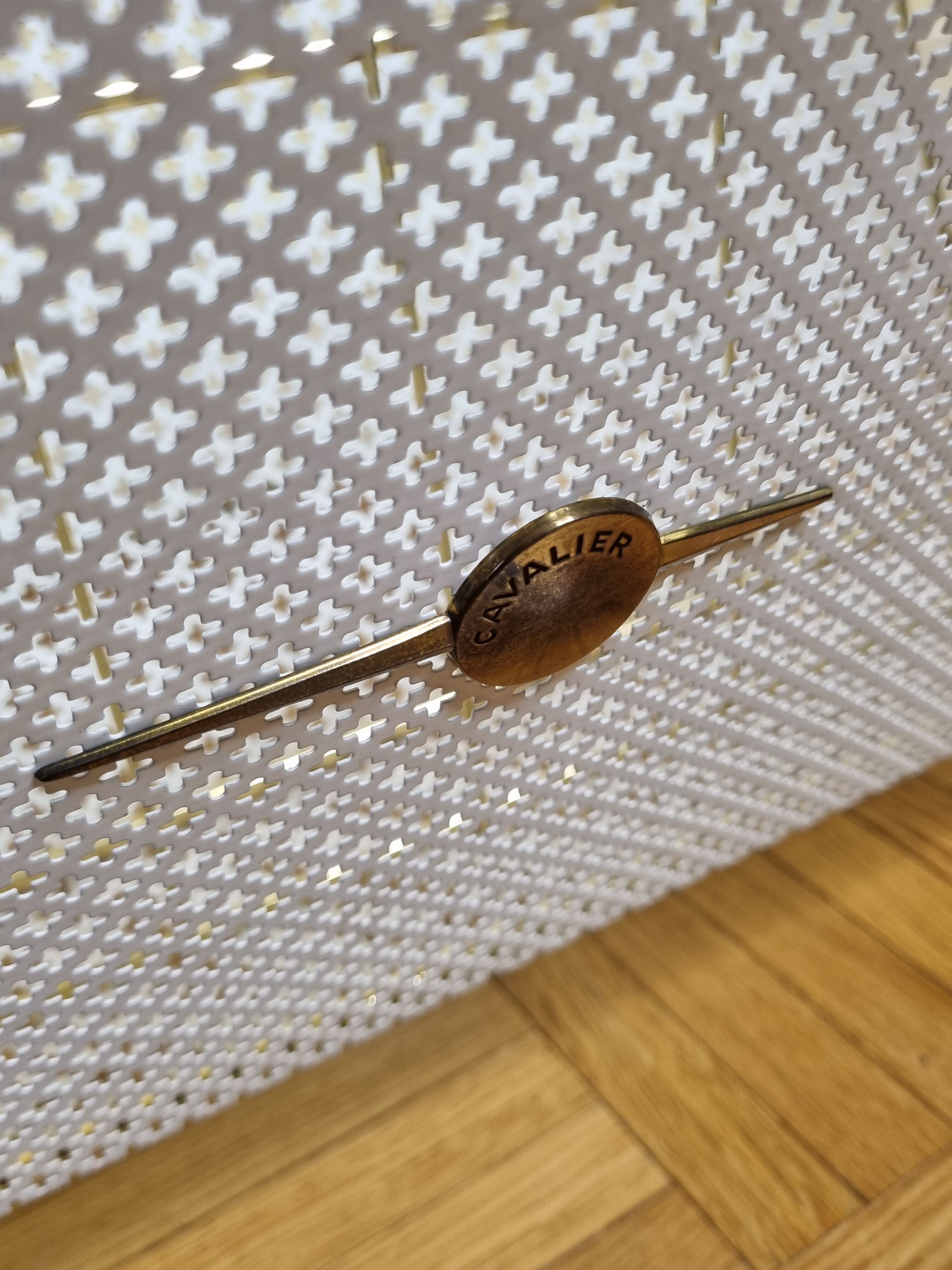 Vintage "Cavalier" magazine rack in white perforated metal and rattan
