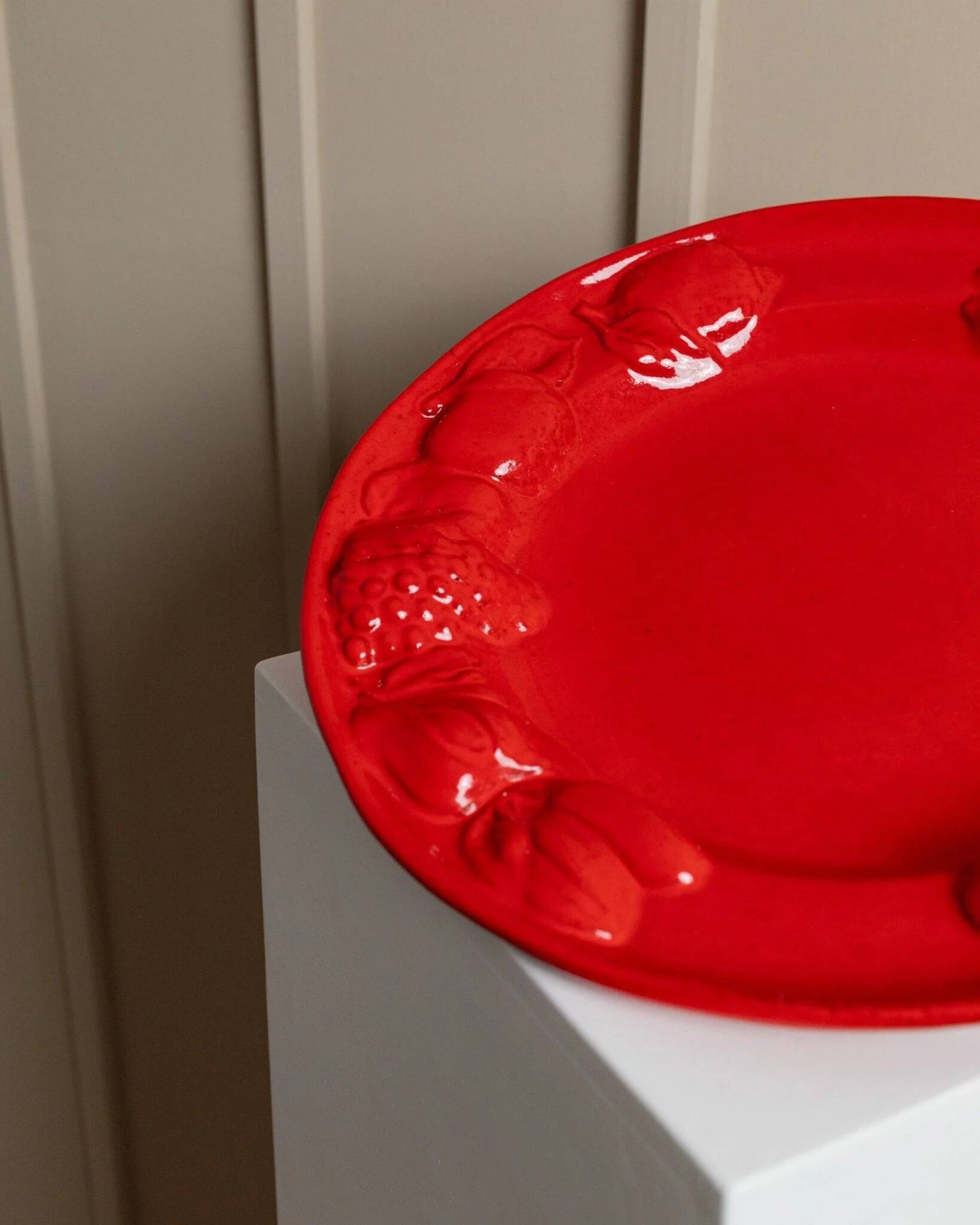 Red glazed ceramic fruit platter with three-dimensional fruit relief, vintage Italy 1980s, Mid-Century design