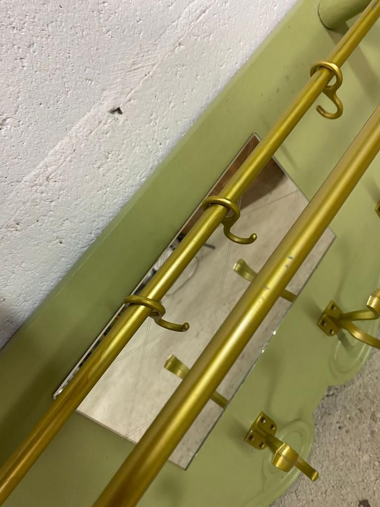 Vintage olive green wall coat rack with mirror