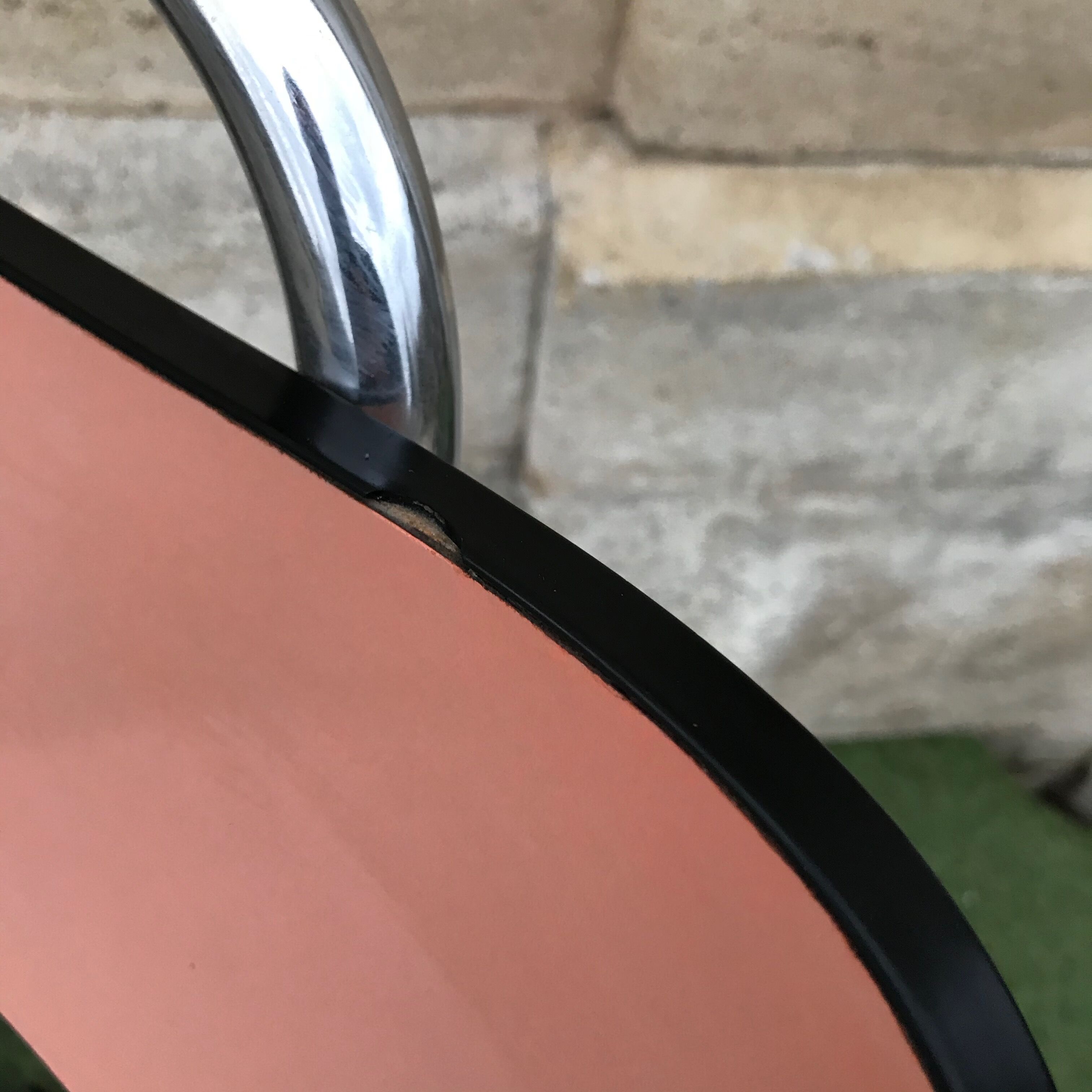 Pink chair in formica