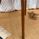 Pretty little vintage round table with tapered legs.