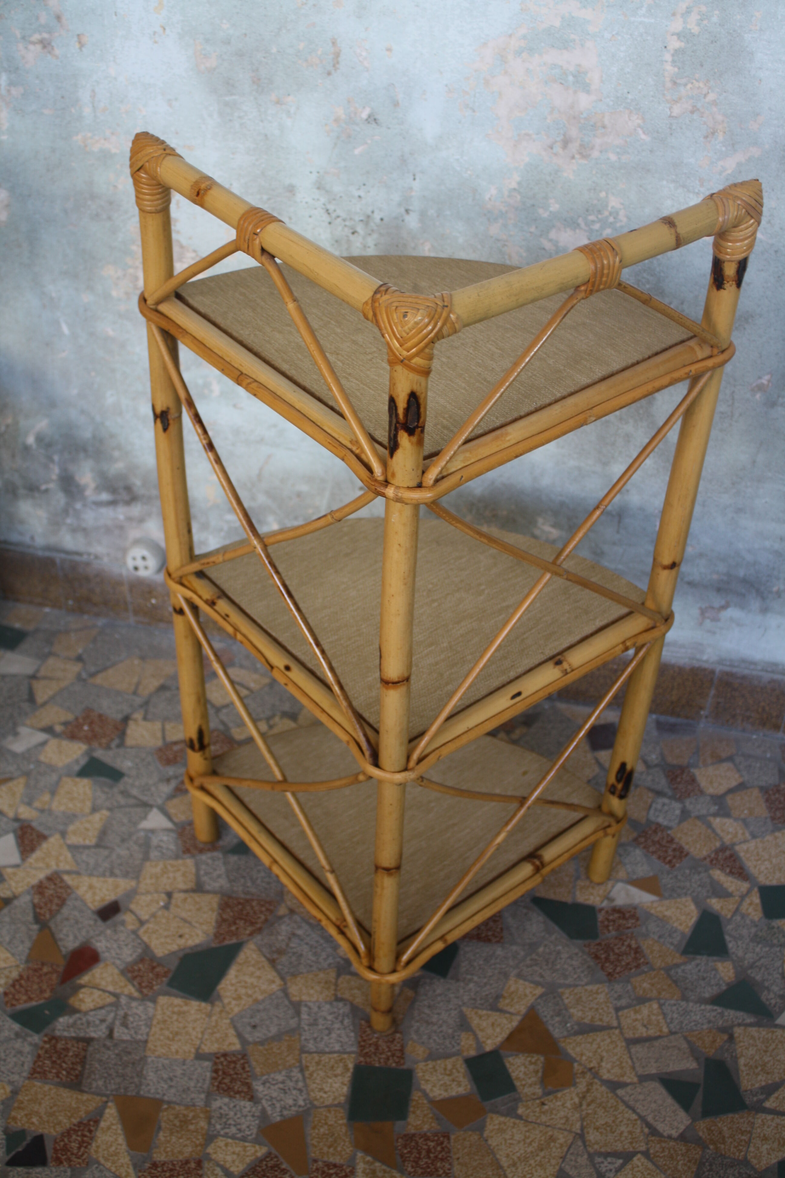 Pair of rattan shelves including a corner shelf