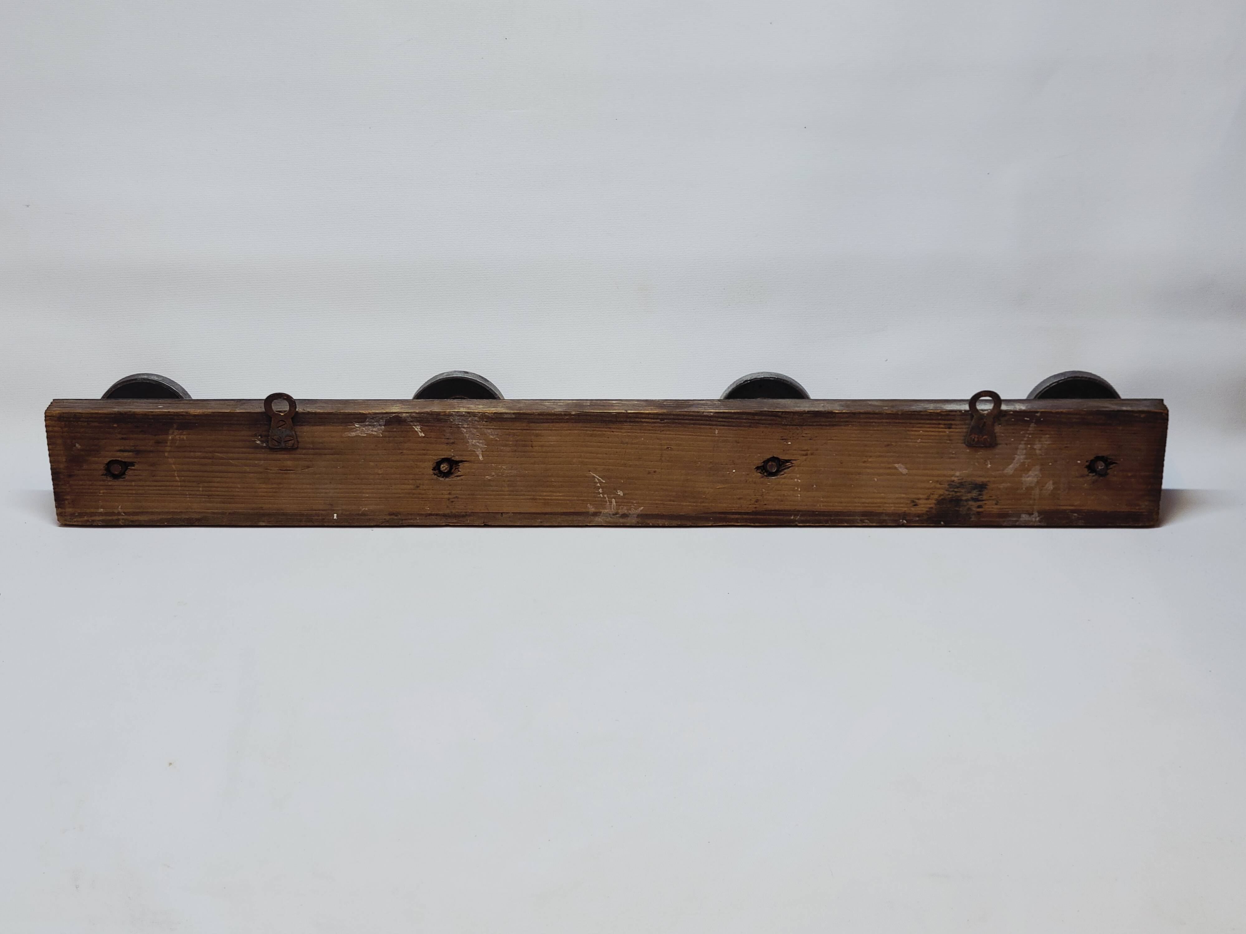 Retro vintage coat rack with 4 aluminum hooks on a wooden frame