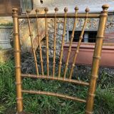 Pair of caned chairs in gilded wood