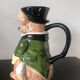 Ceramic jug representing a fox in hunting attire date 1986