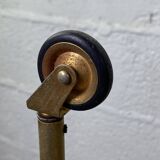 Small rolling trolley in brass and black plastic