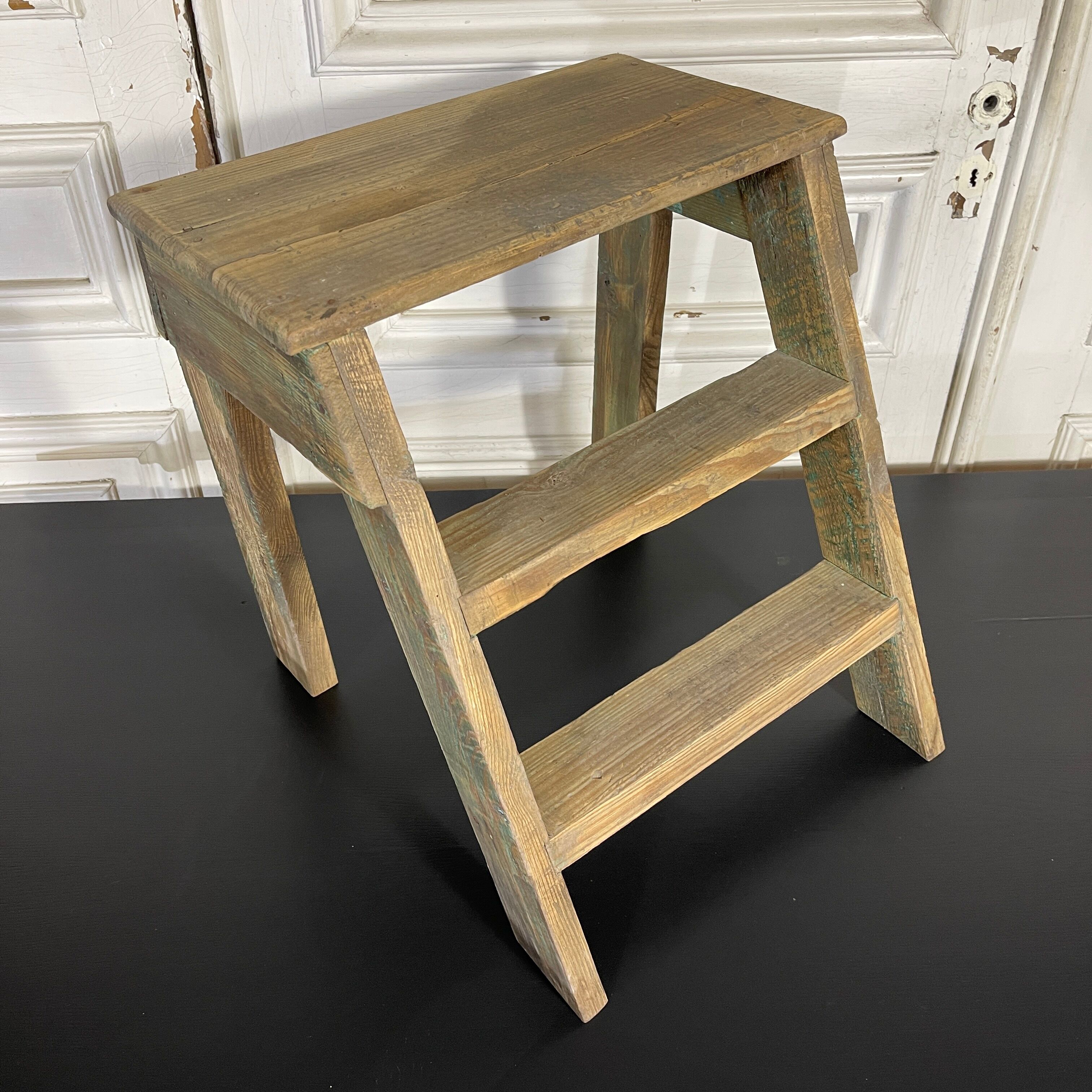 Old wooden foot step