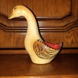 Old saltron painted in ceramic in the shape of a swan