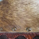 Vintage Spanish stool in carved wood with a leather seat.