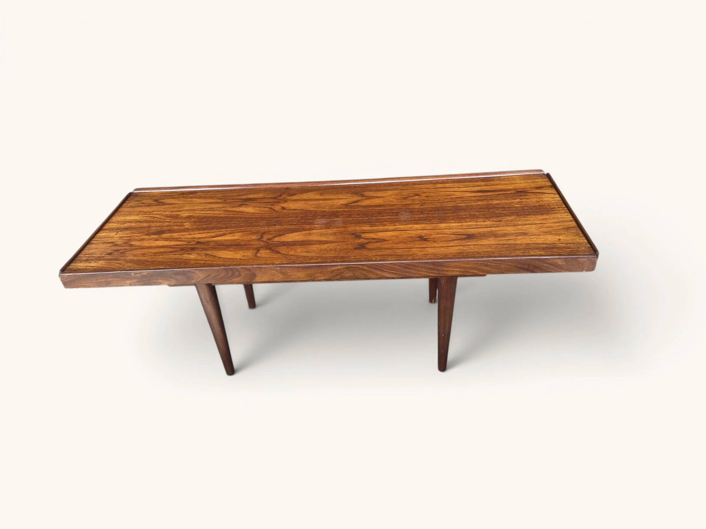 Vintage teak coffee table with a reversible top.