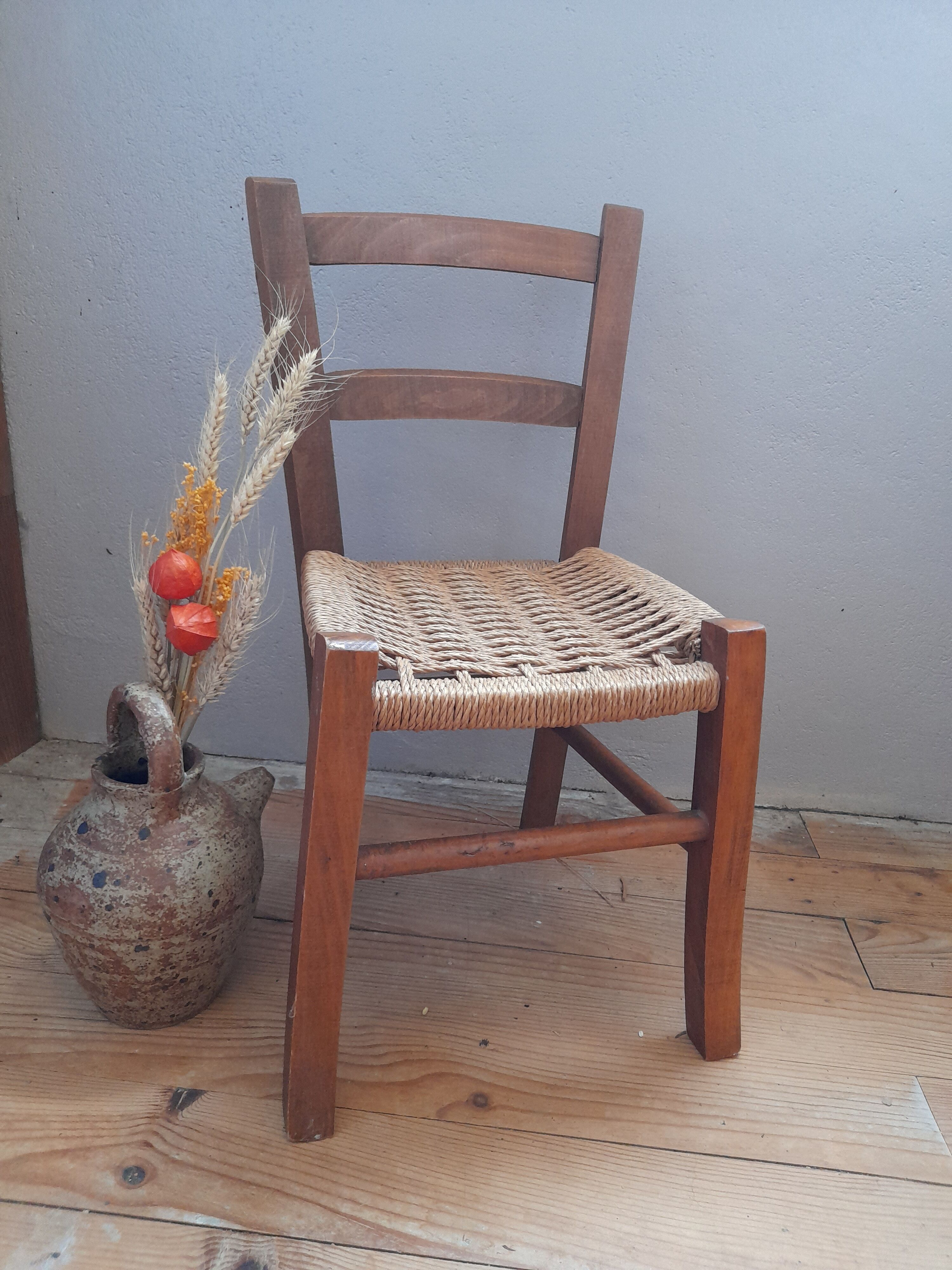 Wooden children's chair, rope seat, circa 1950