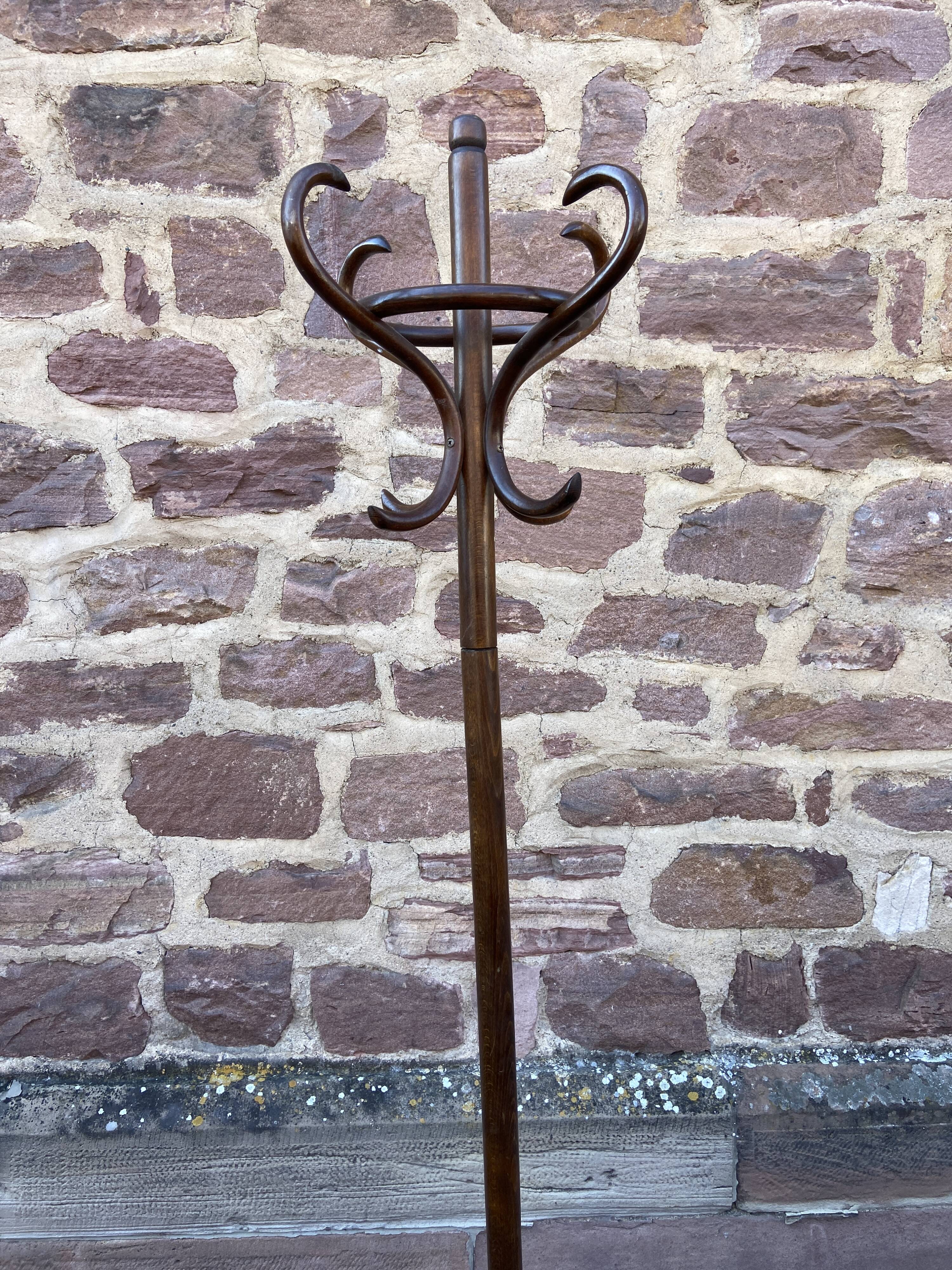 Baumann coat rack on vintage parrot stand