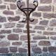 Baumann coat rack on vintage parrot stand