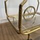 Rolling Table with Large Brass and Glass Wheels, Maison Jansen, Circa 1940