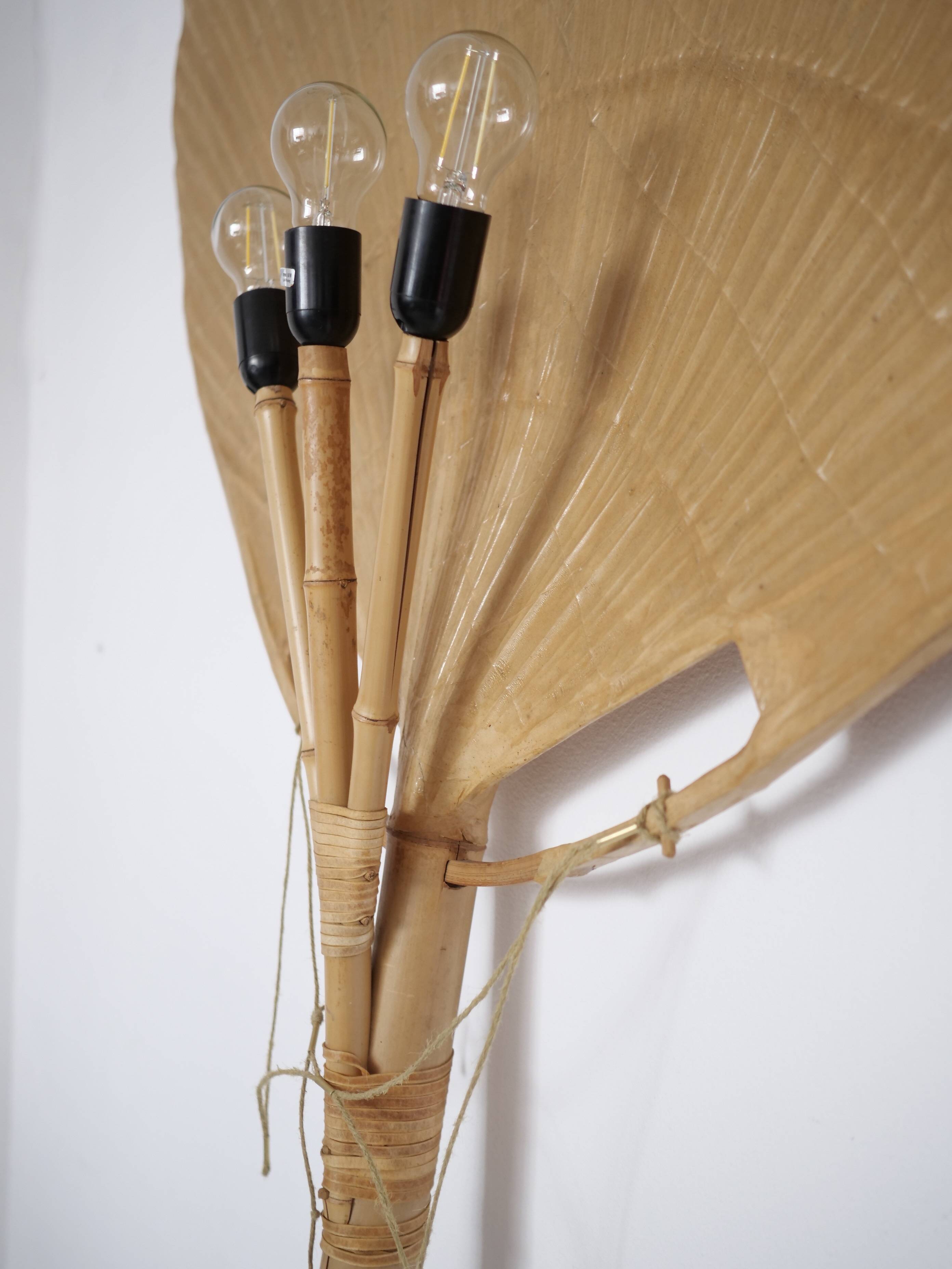 Large-format Uchiwa light fixture designed by Ingo Maurer