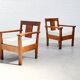 Pair of French modernist teak armchairs, 1960s