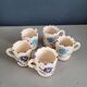 Set of 5 glazed ceramic coffee mugs
