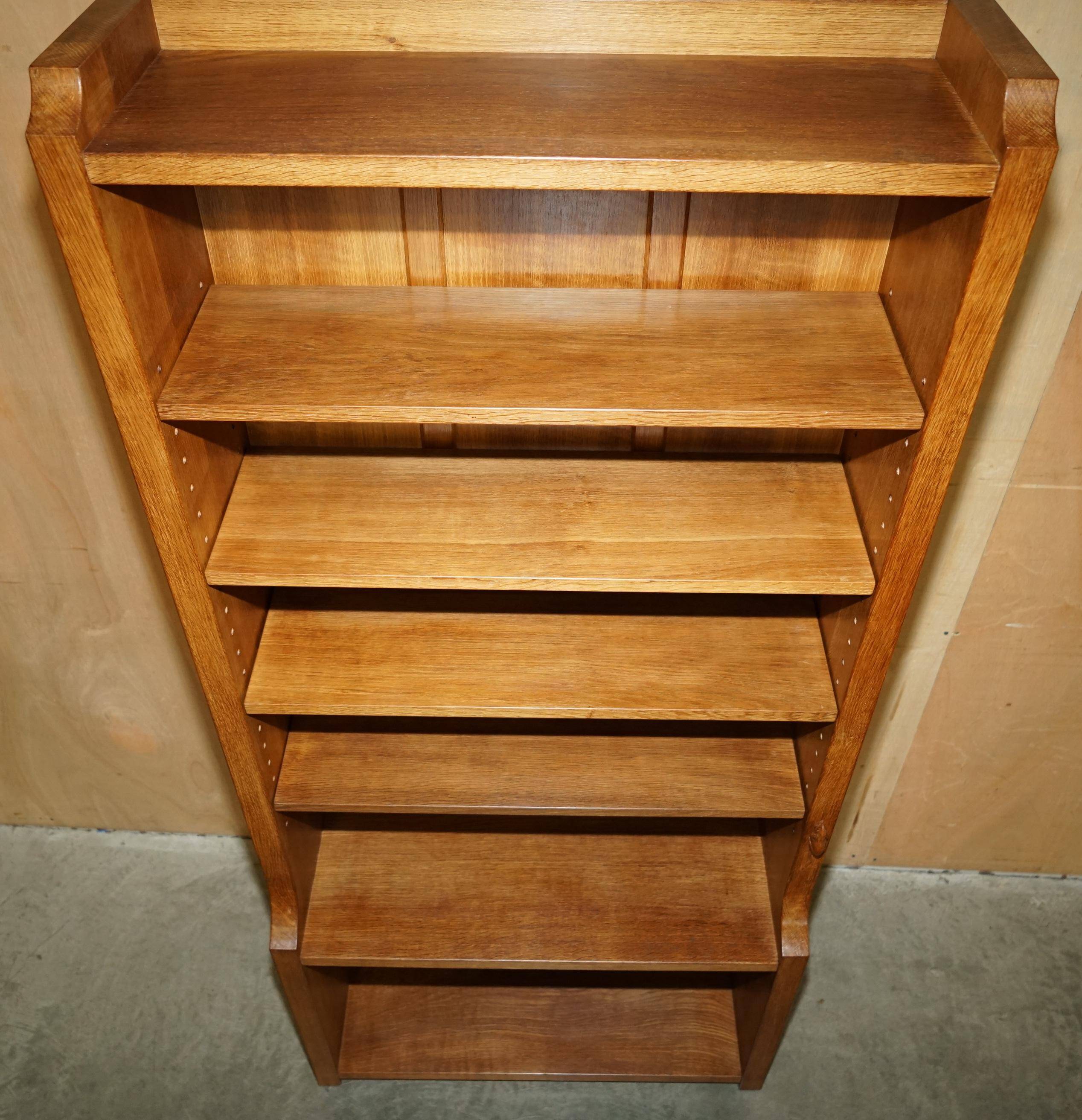 Pair of Robert Mouseman Thompson oak carved bookshelves.