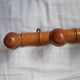 Bamboo-like wall coat rack with 5 mushroom hooks