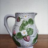 Barbotine pitcher with pastel flower decoration