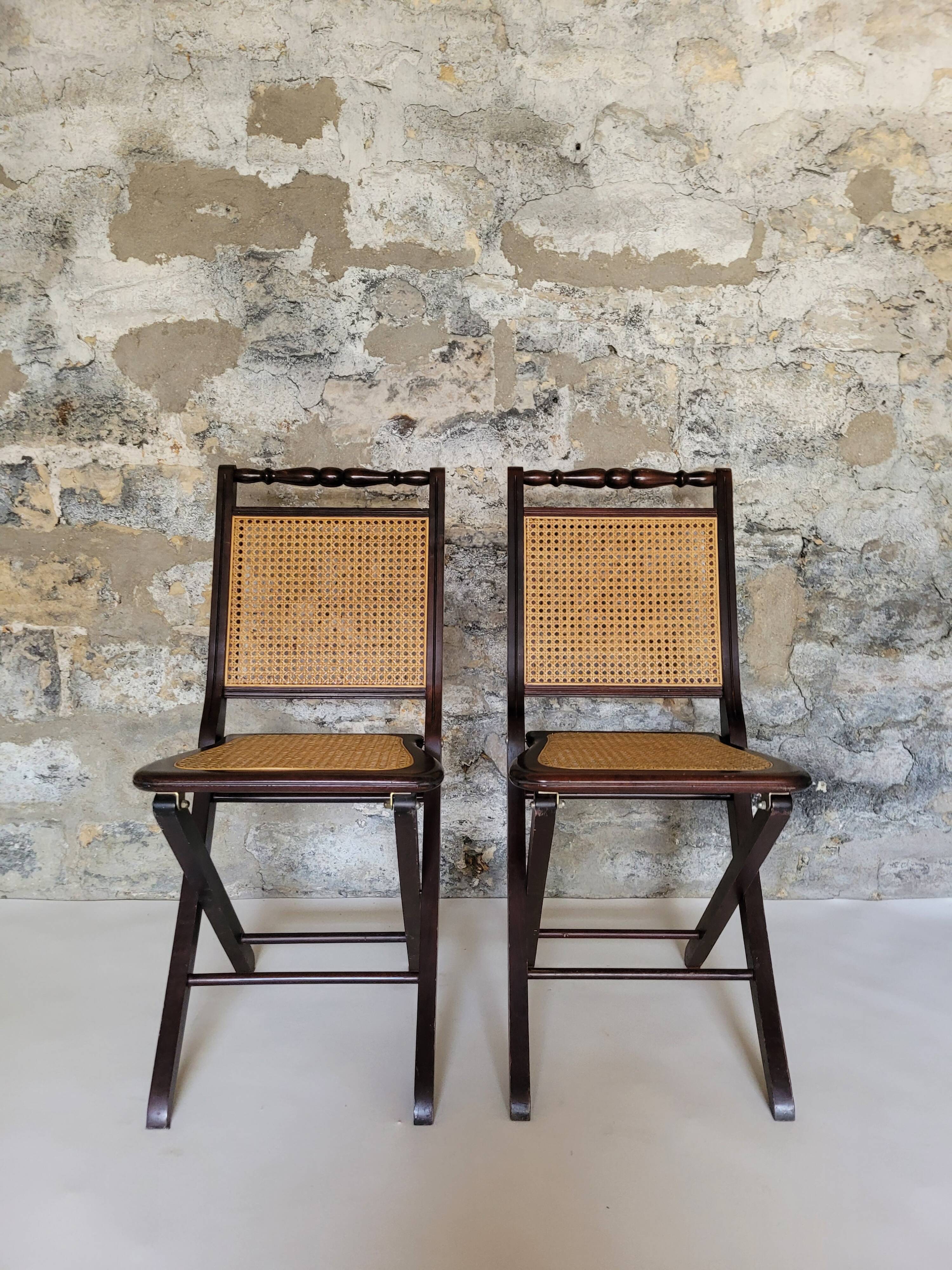Pair of folding cane chairs