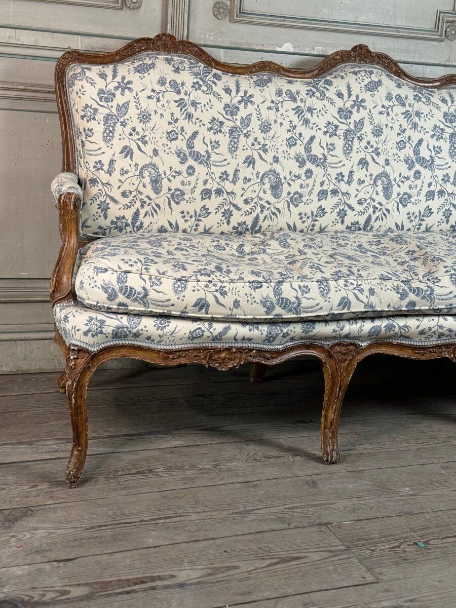 Louis XV bench in carved wood with oak patina, 18th century