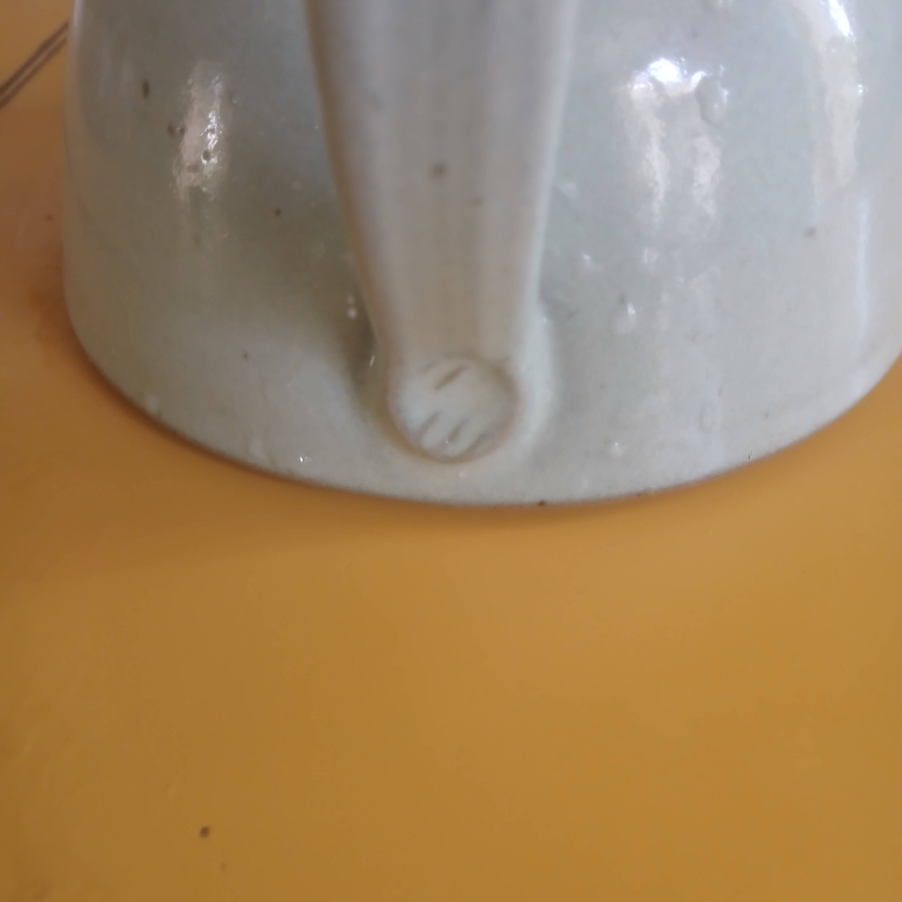 Vintage artisanal style glazed pottery teapot