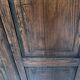 Double cupboard doors in carved oak, 20th century